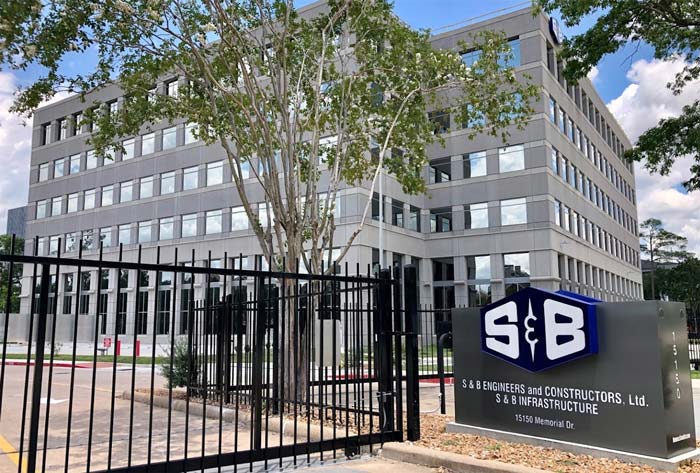 Five story building with a S&B Headquarters sign out front
