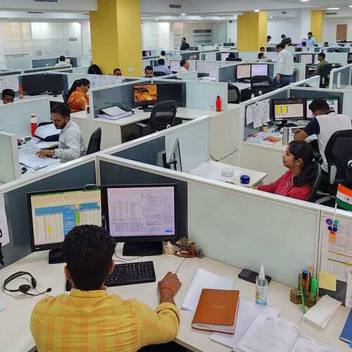 Engineers working in cubicles in S&B's New Dehli center