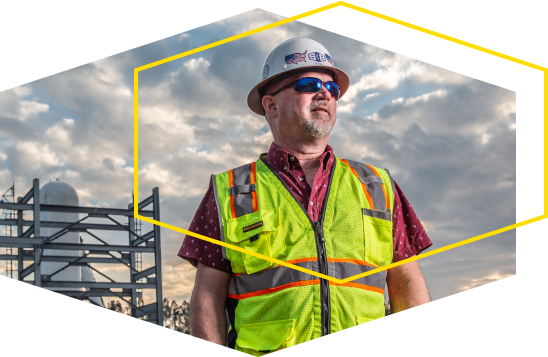 An S&B Employee in construction gear