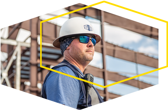 An S&B Employee in construction gear